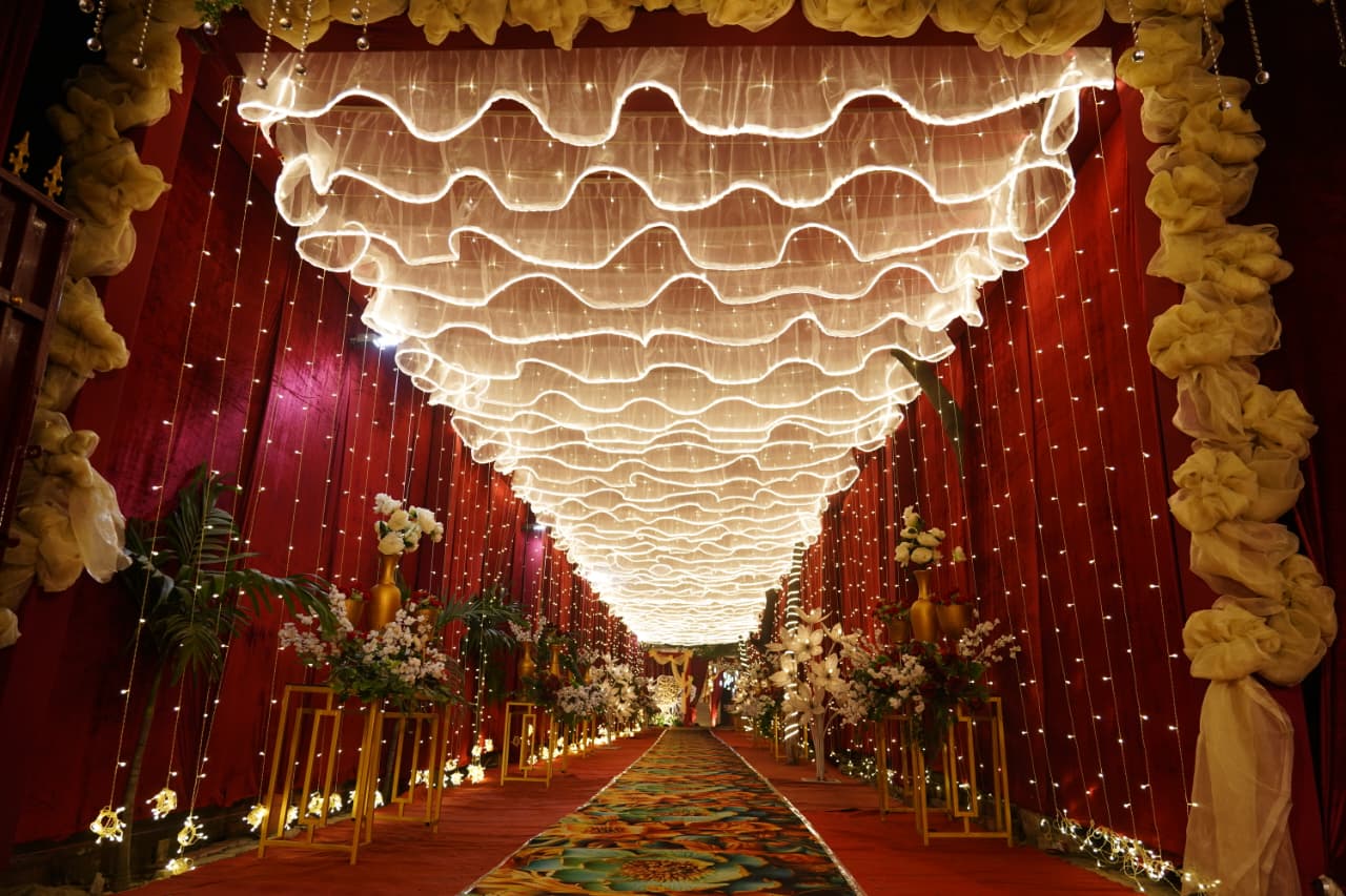 Sahaj Haveli decorated entry walkway with wave ceiling lights